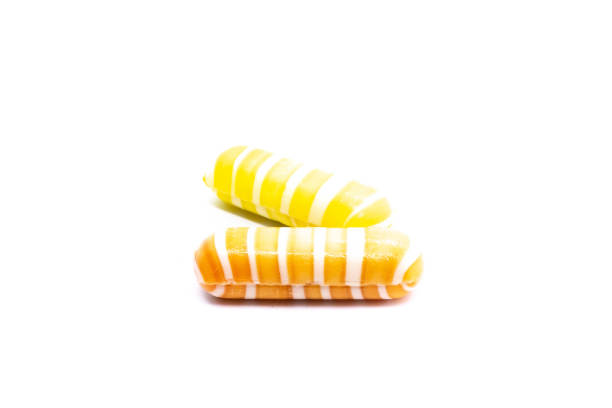 istock Yellow and Orange Candy Canes in Studio 1319316818