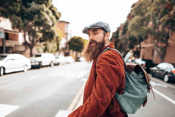 istock casual man hipster walking on the street 1319317230