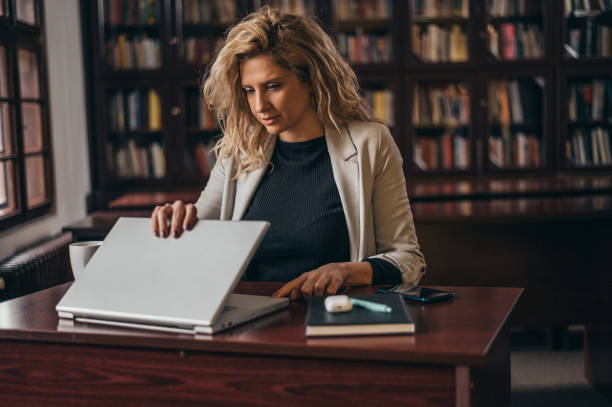 istock Businesswoman using a laptop in the office 1319321664