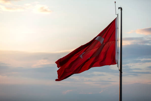 istock Turkish flag flies over the sun 1319322430