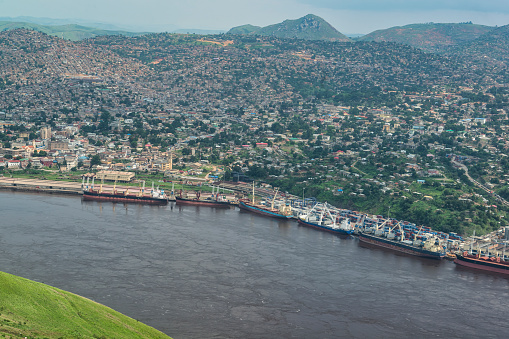 The sea port of Matadi at the Congo River. Matadi is the chief sea port of the Democratic Republic of the Congo, it is the last navigable point before rapids make the river impassable for a long stretch upriver. Matadi is also the capital of the Kongo Central province, it was founded in 1879 by Sir Henry Morton Stanley.