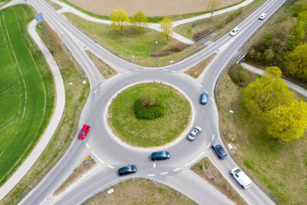 istock Roundabout with Car Traffic, Aerial View 1319328561
