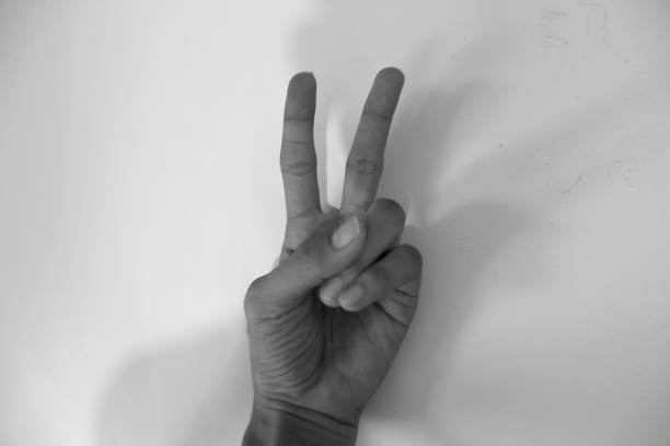 istock hand with two fingers stock photo 1319335973