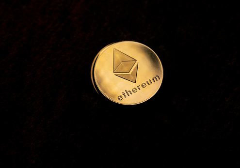 Antalya, Turkey - May 21, 2021:  Close up shot of Ethereum coins cryptocurrency
