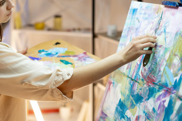 istock painting woman art process abstract artwork hobby 1319338780