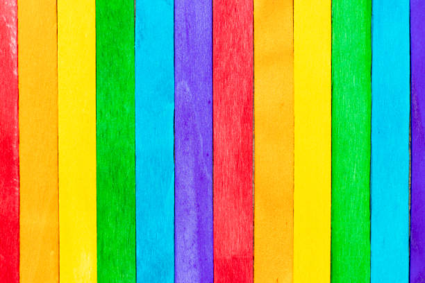 istock Multi color wood plank use as textured background, frame, decoration with copy space (Concept for rainbow or LGBT) 1319357693