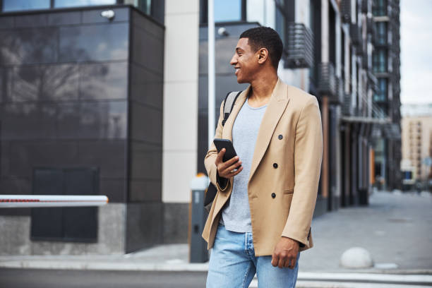 istock Young cheerful man enjoying his morning walk 1319376873