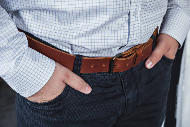 istock A business man in trousers with a leather belt 1319379822