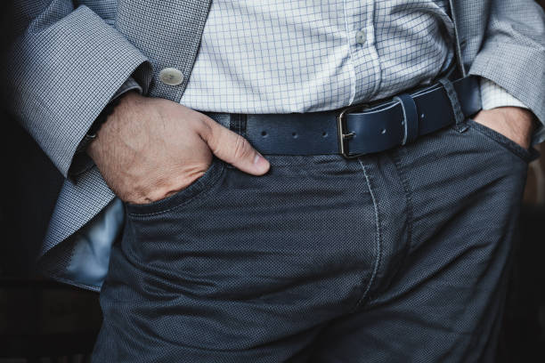 istock A business man in trousers with a leather belt 1319379870