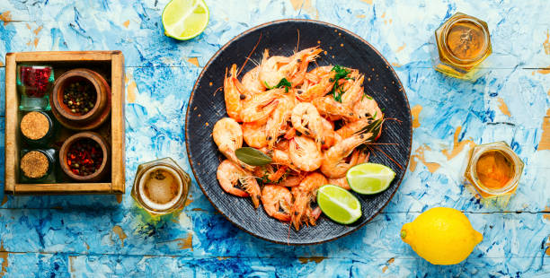 istock Delicious boiled prawns and beer 1319383623