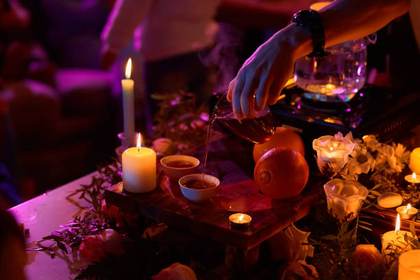 Tea ceremony, candles roses and stones, spa relaxation stock photo