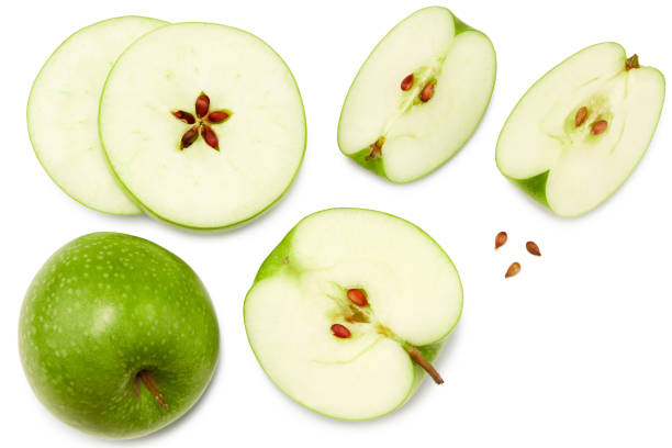 istock green apple with slices isolated on a white background. top view. clipping path 1319383965