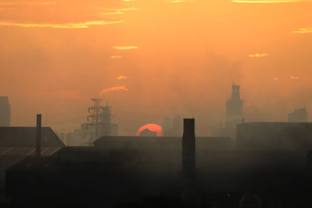 istock Sunset on the smoke City 1319385036