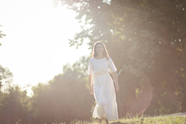 istock Happy Woman spending time in nature. 1319385549