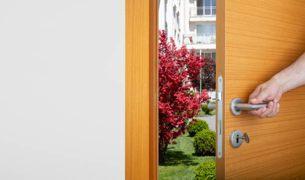 istock the man's hand opening the door 1319386909