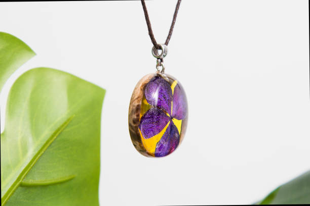 istock Real flowers in epoxy resin, jewelry 1319389047