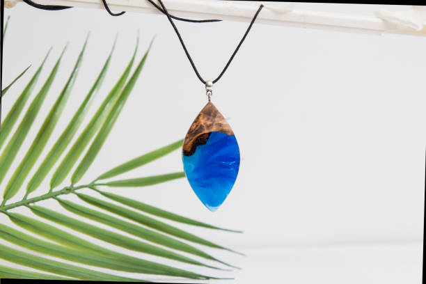 istock Real flowers in epoxy resin, jewelry 1319389253