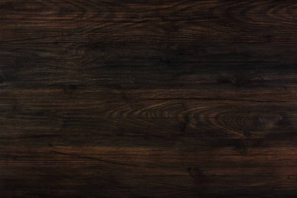istock Brown wooden background. Wood dark abstract texture. 1319389404