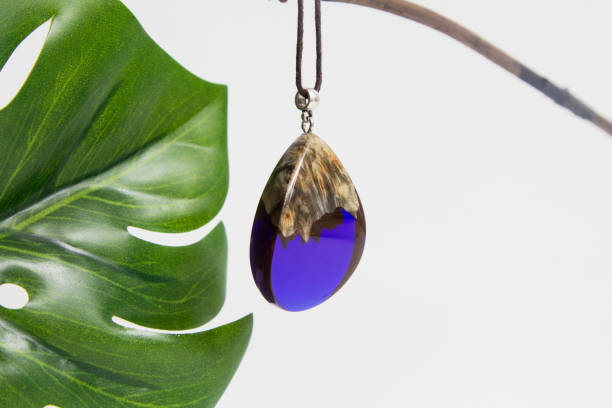 istock Real flowers in epoxy resin, jewelry 1319397559
