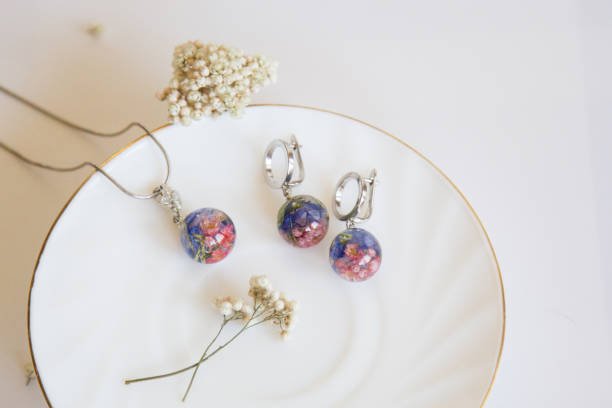 Real flowers in epoxy resin, jewelry
