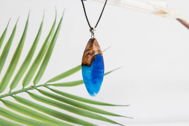 istock Real flowers in epoxy resin, jewelry 1319402108