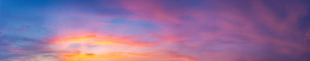 istock Dramatic panorama sky with cloud on sunrise and sunset time. 1319404991