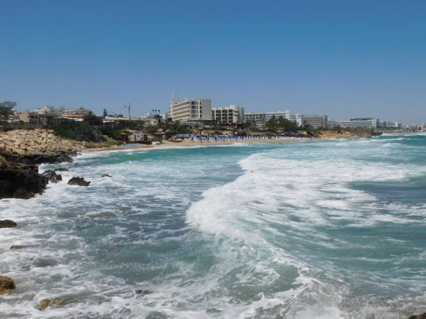 istock waves on the rocky coast. fig tree beach. Protaras. Ayia Napa. Cyprus. 1319407644