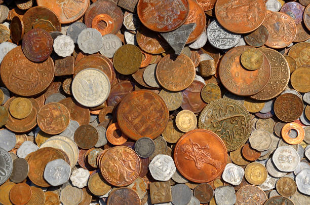 Small pile of Doubloons and Reales.