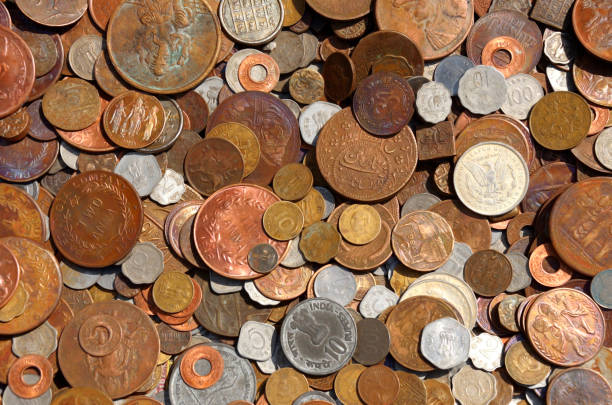 istock Coins of different countries Background. 1319410478