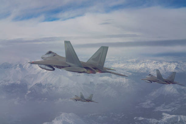 istock Jet fighters flying over the clouds. 1319412484