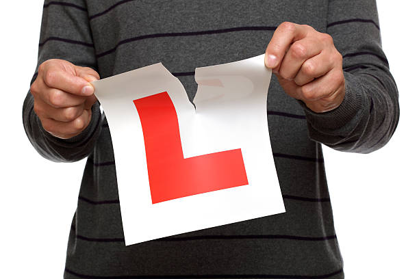 Tearing up L plate after passing driving test