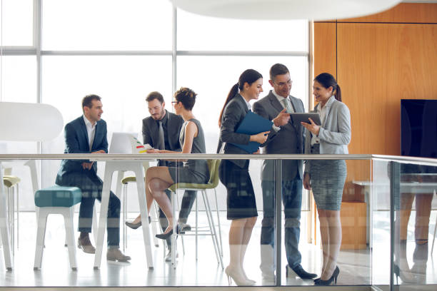 istock Business people discussing business strategy using digital tablet 1319416567