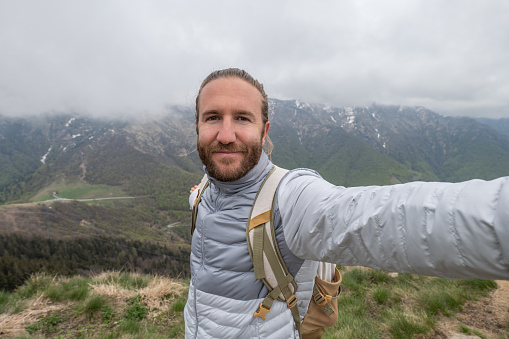 Portrait of a young bearded man in front of Istanbul view