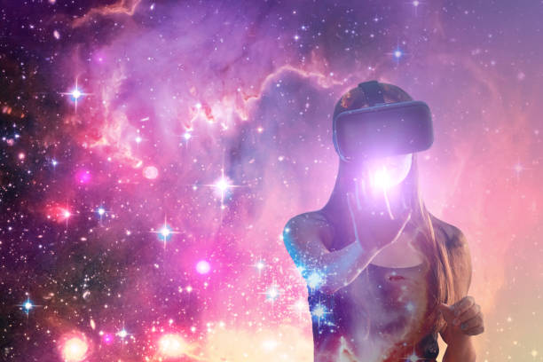 istock Augmented reality concept, girl in vr helmet in space galaxy, modern technology gadgets in video games, copy space,Element of the image provided by NASA 1319421944