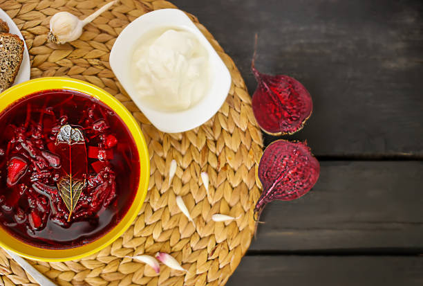 istock Red borscht or beetroot soup with sour cream 1319422480