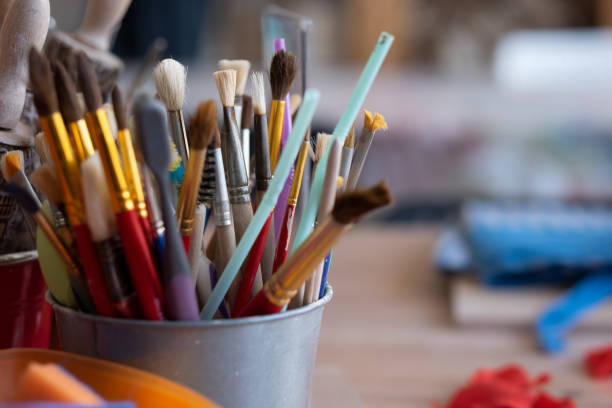 istock Paint brushes close up. Tools for art lesson at school. 1319437113