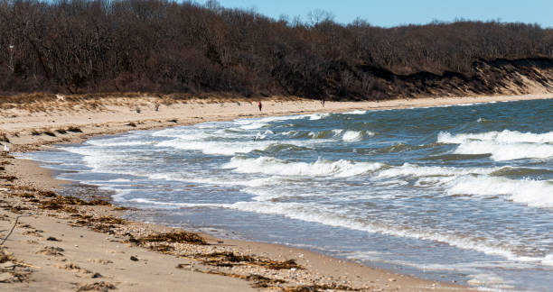 istock Rough water on windy day at Sunken Meadow State Park beach 1319440340