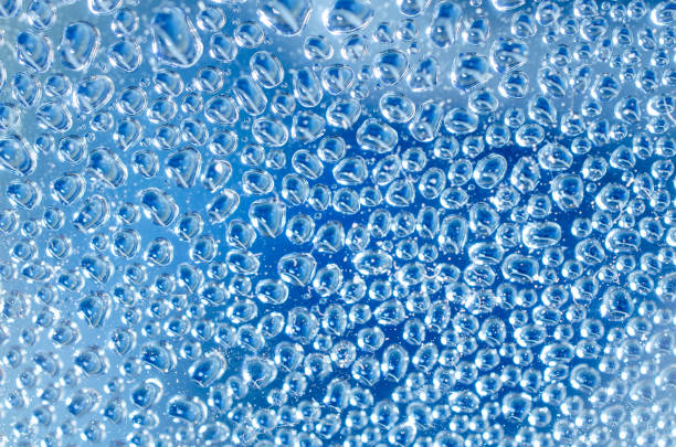 istock Abstract water bubble background in blue tone, selective focus 1319441025