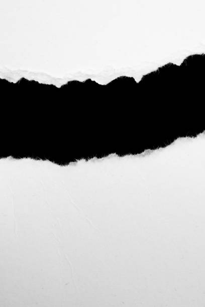 istock a white piece of paper on a black isolated background 1319442946