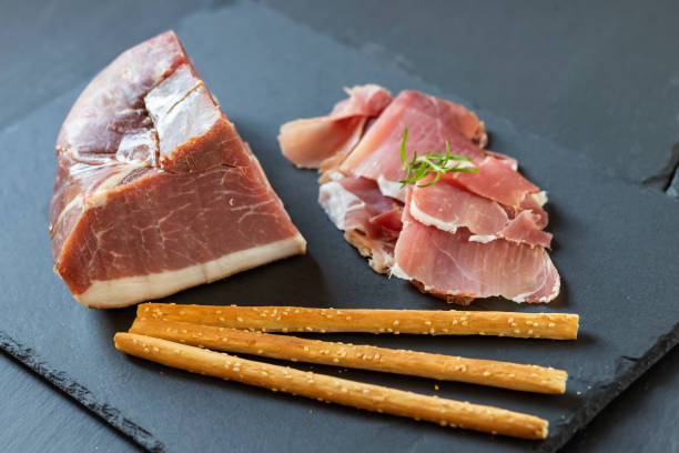 istock Italian ham served with grissini 1319446422