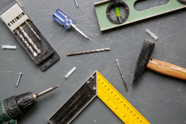 istock Tools on wooden table top view. Handicraft and hobby equipment. 1319448361