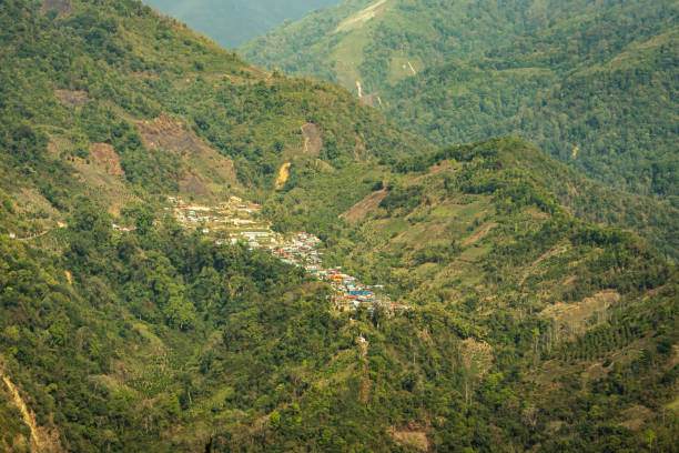 istock village at mountain range with dense green forests at morning from flat angle 1319448763