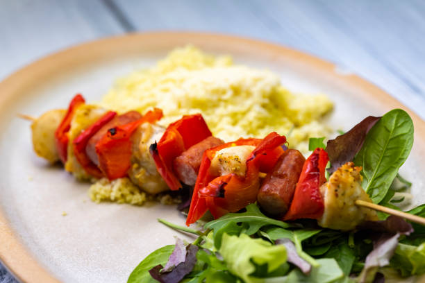 istock Chicken skewer with red pepper and sausage 1319453899