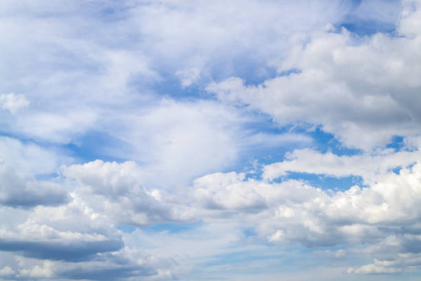 istock The blue sky shines through the clouds. Many white clouds on a sunny day. Natural background. 1319454995