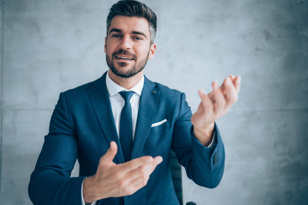 istock Businessman talking during video call in the office. 1319457040