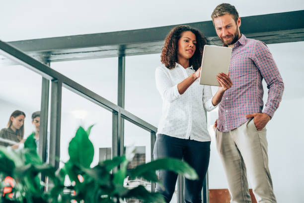 istock Young business people in office. 1319457376