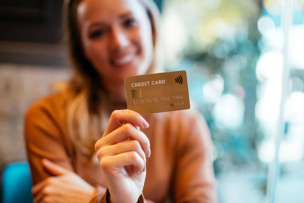 Woman holding a credit card