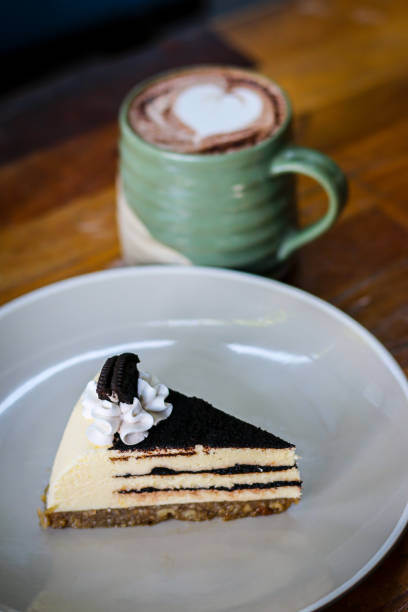 istock Chocolate cheesecake and cappuccino for breakfast 1319458236