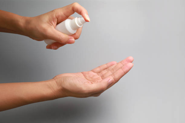 istock Coronavirus prevention. Use sanitiser on your hand 1319458249