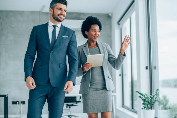 istock Business conversation in the office. 1319458282